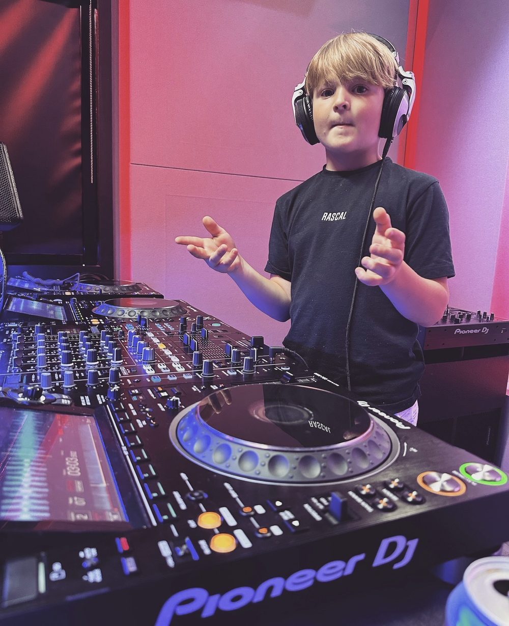 DJ Archie on Pioneer DJ decks in the studio